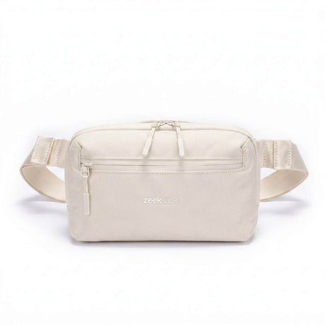 Zeeksack Crossbody Organizer i Sand White med ljusbeige axelrem och framficka.
