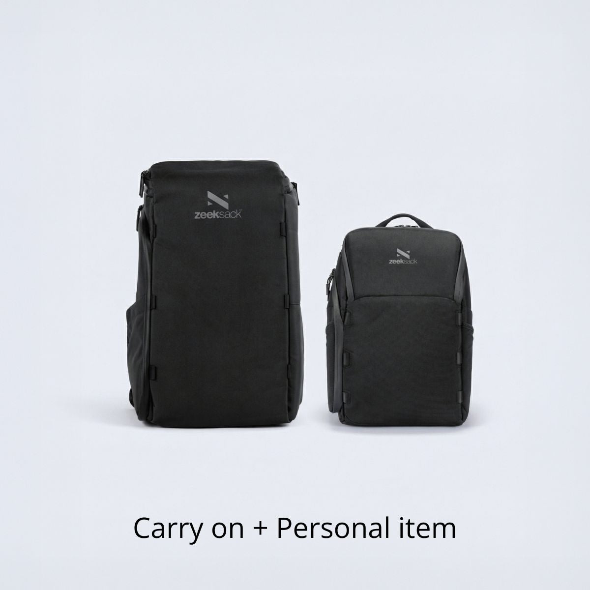 Paket med svart Zeeksack The Organizer 30L och The Underseat 15L.